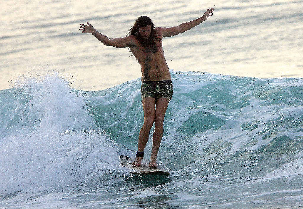 LEFT: Angus, a good surfer who understands the value of not taking it too seriously. LEFT: Angus, a good surfer who understands the value of not taking it too seriously.